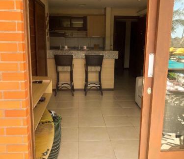 Cumbuco Apartment | Kariri Beach: Oceanfront Retreat with Pool & High Ratings