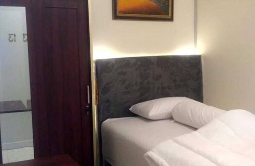 Palmerah House | Budget-Friendly Katalia Tomang with Breakfast & Child Care
