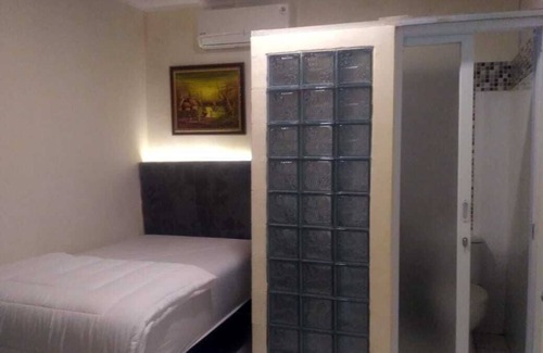 Palmerah House | Budget-Friendly Katalia Tomang with Breakfast & Child Care