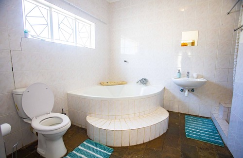 Windhoek House | Kate's Nest Guesthouse: Family-Friendly Retreat with Pool