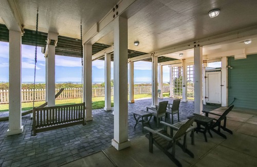 Beachside Village Cottage | Unforgettable Stay at Kathie's Beachfront Kottage