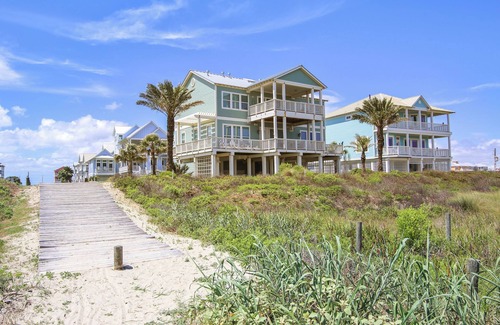 Beachside Village Cottage | Unforgettable Stay at Kathie's Beachfront Kottage