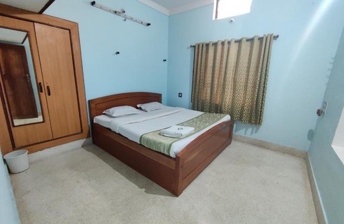 Kuvempu Nagara House | Comfortable Kavitha House Homestay with Pet-Friendly Amenities