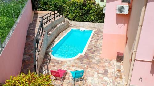 Trois-Rivieres Apartment | Oceanfront Getaway at Kay Margo with Pool & Scenic Views