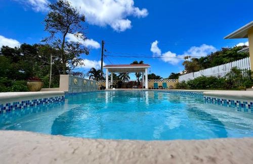 Bois d'Orange Apartment | Relax at Kay Nou Apartments: 4-Star Oceanfront Escape