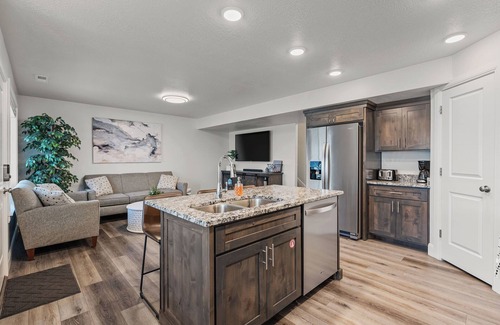 Garden City House | Family Fun Awaits: Kayaks, Theater & Arcade Adventures!