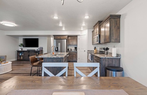 Garden City House | Family Fun Awaits: Kayaks, Theater & Arcade Adventures!