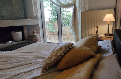 Lavreotiki House | Inviting KD Boho Home: Family-Friendly with High Ratings