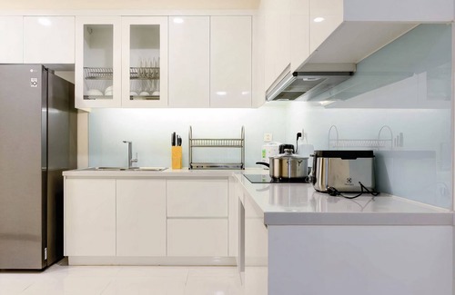 Hang Xanh Apartment | Explore Kelly House: Spa, Pool & Kitchen Amenities Await
