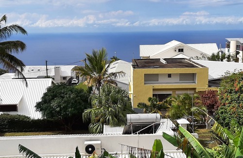 La Montagne Apartment | Scenic Kerlérun Apartment with Pool & Sea View in Saint-Denis