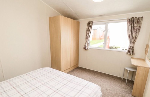 Cayton Bay Cottage | Pet-Friendly Kestrel 7 Cottage with Pool and Ocean Views