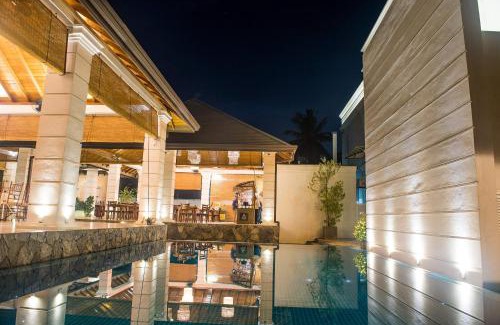 Mahiyanganaya Hotel | Relax at Kevans Casa: 4-Star Oceanfront Retreat with Pool