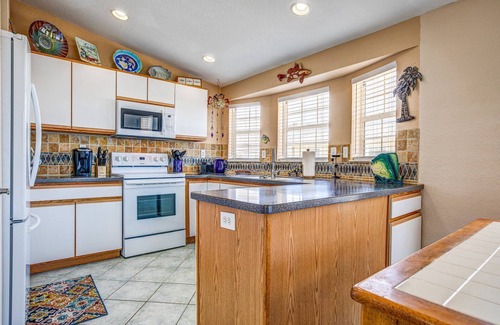Breezeswept Beach Estates House | Idyllic Key Blessing: Your Canal Front Retreat with Dockage