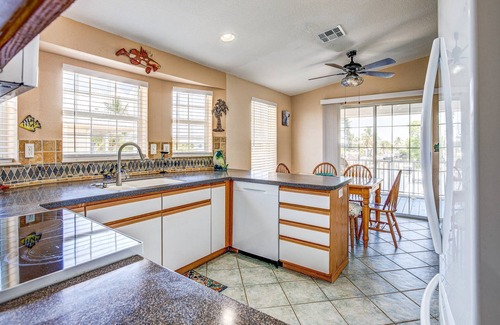 Breezeswept Beach Estates House | Idyllic Key Blessing: Your Canal Front Retreat with Dockage