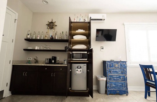 Dunedin Cottage | Indulge in a Key West Style Cottage with Pool & Hot Tub
