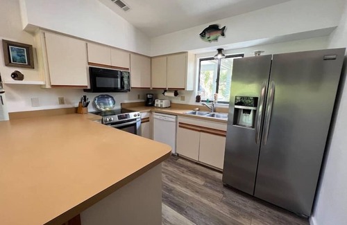 Placida House | Discover Key2TheSea: Tropical Treehouse with Decks & Privacy