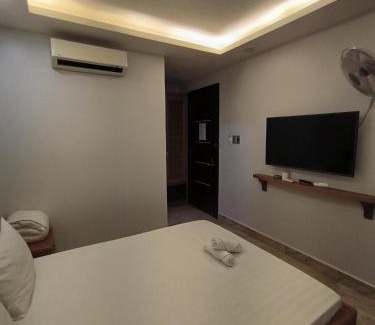 Binh Chanh Hotel | Family-Friendly Comfort at Khách Sạn Hoàng Phúc 2