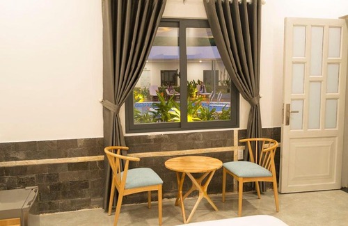 Thu Dau Mot Hotel | Discover Khang Điền 2: Family-Friendly Escape with Pool