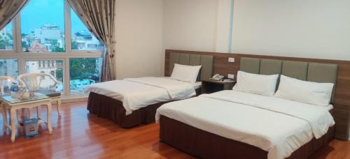 Long Bien Hotel | Discover Khách sạn Phúc Thành: Family-Friendly Retreat