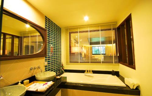 Khuk Khak Beach Resort | Unwind at Khaolak Orchid Beach Resort with Oceanfront Relaxation