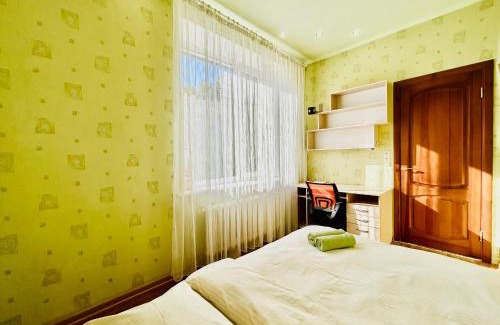 Petrovskoye Apartment | Family-Friendly Retreat at Kholodnaya Gora with Hot Tub