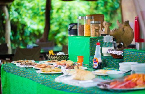 Kibale Cabin | Discover Kibale Forest Camp: Family-Friendly Retreat