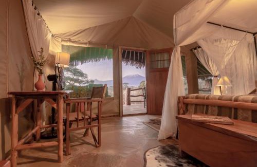Amboseli Cabin | Explore Kibo Safari Camp: Child-Friendly with Pool Access