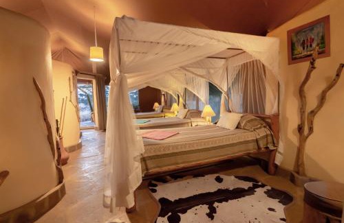 Amboseli Cabin | Explore Kibo Safari Camp: Child-Friendly with Pool Access