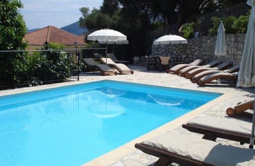 Matsoukata Apartment | Relax at Kiki Studios: Oceanfront Bliss with Pool Access