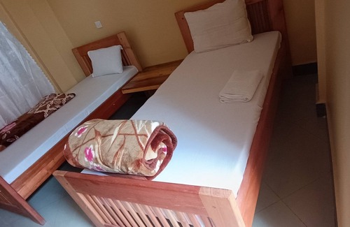 Moshi Cabin | Discover Kilele Lodge: Family-Friendly Haven with Breakfast