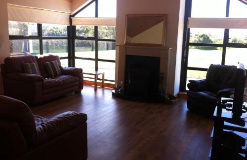 Duncormick House | Elegant Kilmore Quay Castleview: 4-Star Guest Favorite