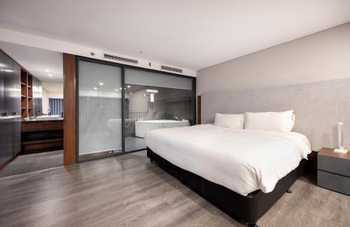 Tay Ho Apartment | Elegant Duplex Apartment at PentStudio with Bridge Views