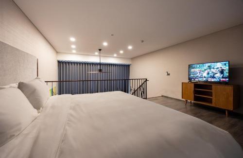Tay Ho Apartment | Elegant Duplex Apartment at PentStudio with Bridge Views
