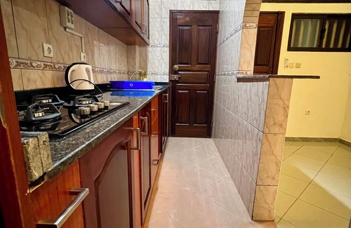 Luanda Apartment | Kinaxixi Palace in Largo rehabilitated. Spacious apartment with balcony.