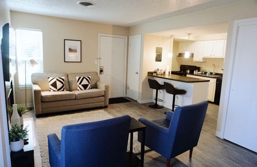 Central City Apartment | Comfortable King Bed & Pool in Downtown with Cleaning Protocol
