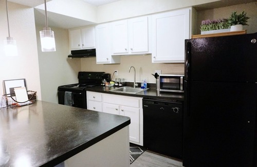 Central City Apartment | Comfortable King Bed & Pool in Downtown with Cleaning Protocol
