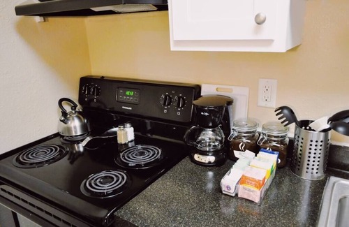 Central City Apartment | Comfortable King Bed & Pool in Downtown with Cleaning Protocol