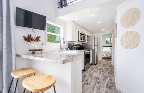 Guntersville Cottage | Romantic Tiny Home with Firepit & Eco-Friendly Amenities