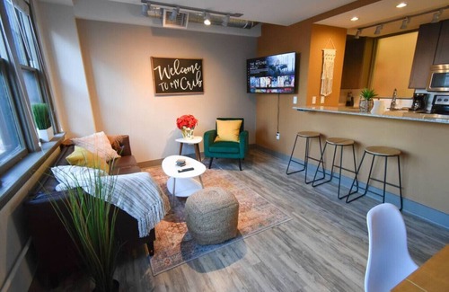 Hanover Place Apartment | Spacious King Bed Near Uptown Theater with Breakfast