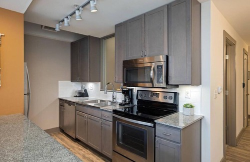Hanover Place Apartment | Spacious King Bed Near Uptown Theater with Breakfast