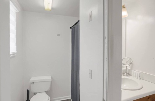 Halifax Apartment | Relax in King Room 101 at Halifax Inn with Spa Access