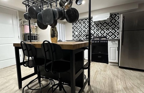 Eastwick House | Pet-Friendly King Suite Oasis with Kitchen & Family Amenities