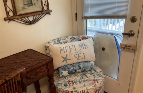 New Smyrna Beach Cottage | Kingfisher Cottage on Canal and two blocks to Ocean, amidst a tropical landscape