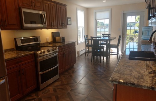 Marion Station House | Elegant Kingsbay Mansion Bayhouse with Oceanfront Views