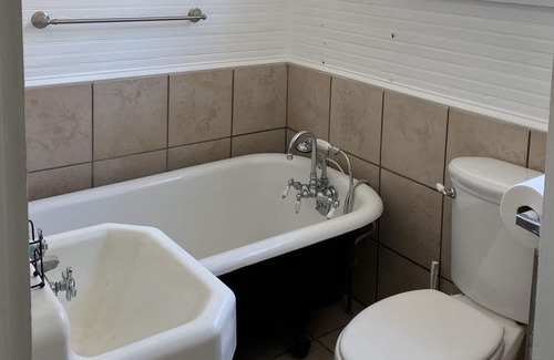 Spanish Town Historic District House | Elevated Comfort: Ensuite Bath & Breakfast Included