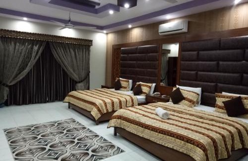 PECHS House | Comfortable Kingston Motel with Family-Friendly Amenities