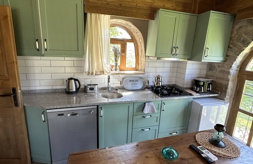 Gokceada Apartment | Experience Kinzi İmroz: Rated 10/10 with Family-Friendly Amenities