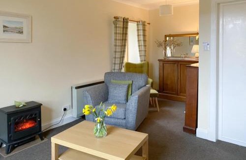 Kilmichael Glassary House | Cozy Kirnan Cottage: Family-Friendly Retreat Awaits You