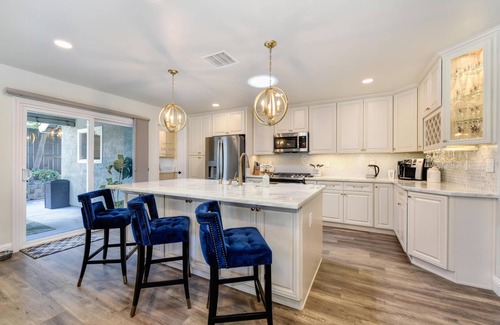 Roseville House | Experience Kissing Turtle Lagoon: Pool, Spa & Fire Pit Fun!