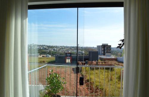 Passos Apartment | Kitnet equipada e aconchegante